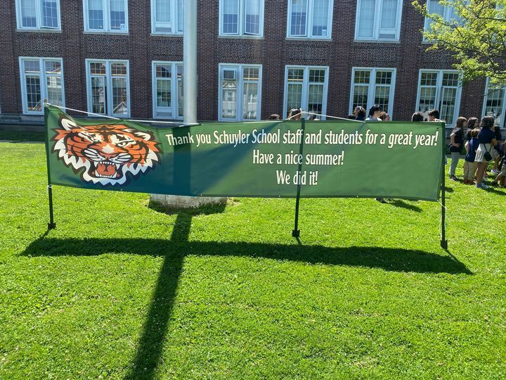 Thank you Schuyler School staff and students for a great year. Have a nice summer! We did it! Banner on yard.